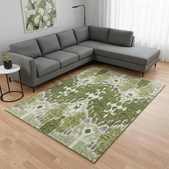 Olive Green Ivory And Gray Ikat Washable Area Rug With UV Protection Photo 2