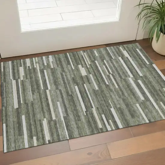Olive Green Ivory And Gray Striped Washable Area Rug With UV Protection Photo 1