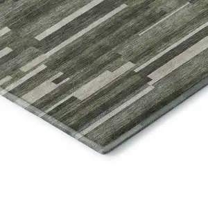 Photo of Olive Green Ivory And Gray Striped Washable Area Rug With UV Protection