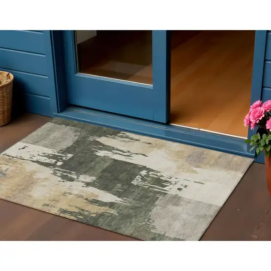 Olive Green Ivory And Tan Abstract Washable Indoor Outdoor Area Rug Photo 1