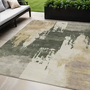 Photo of Olive Green Ivory And Tan Abstract Washable Indoor Outdoor Area Rug