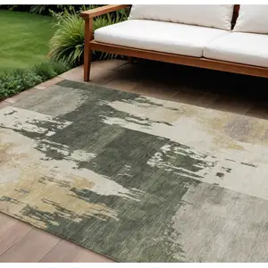 Photo of Olive Green Ivory And Tan Abstract Washable Indoor Outdoor Area Rug