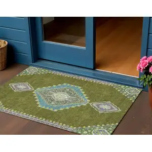 Photo of Olive Green Pink And Ivory Oriental Washable Indoor Outdoor Area Rug