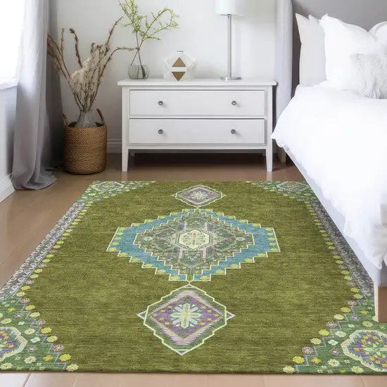 Olive Green Pink And Ivory Oriental Washable Indoor Outdoor Area Rug Photo 9