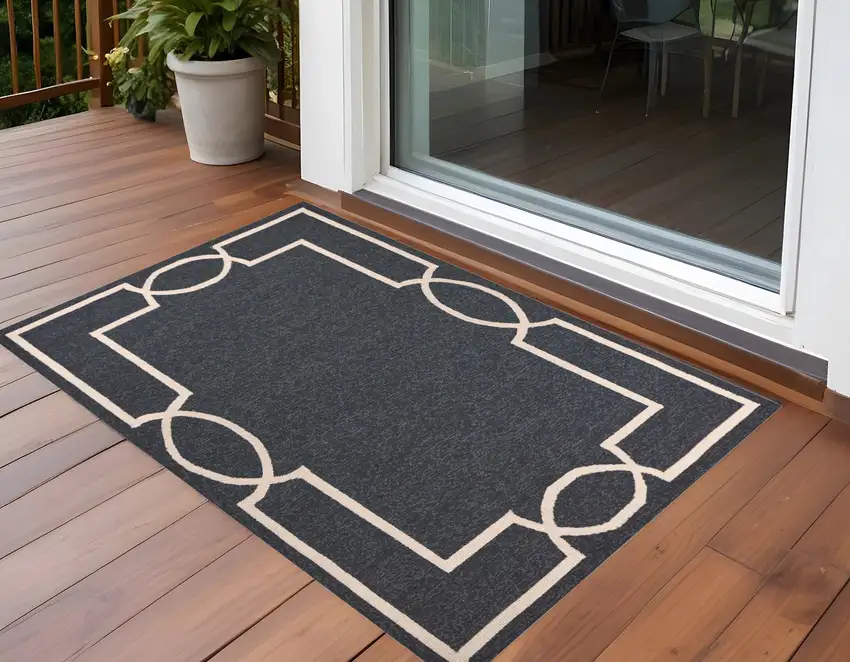 Gray and Ivory Handmade Indoor Outdoor Area Rug Photo 1