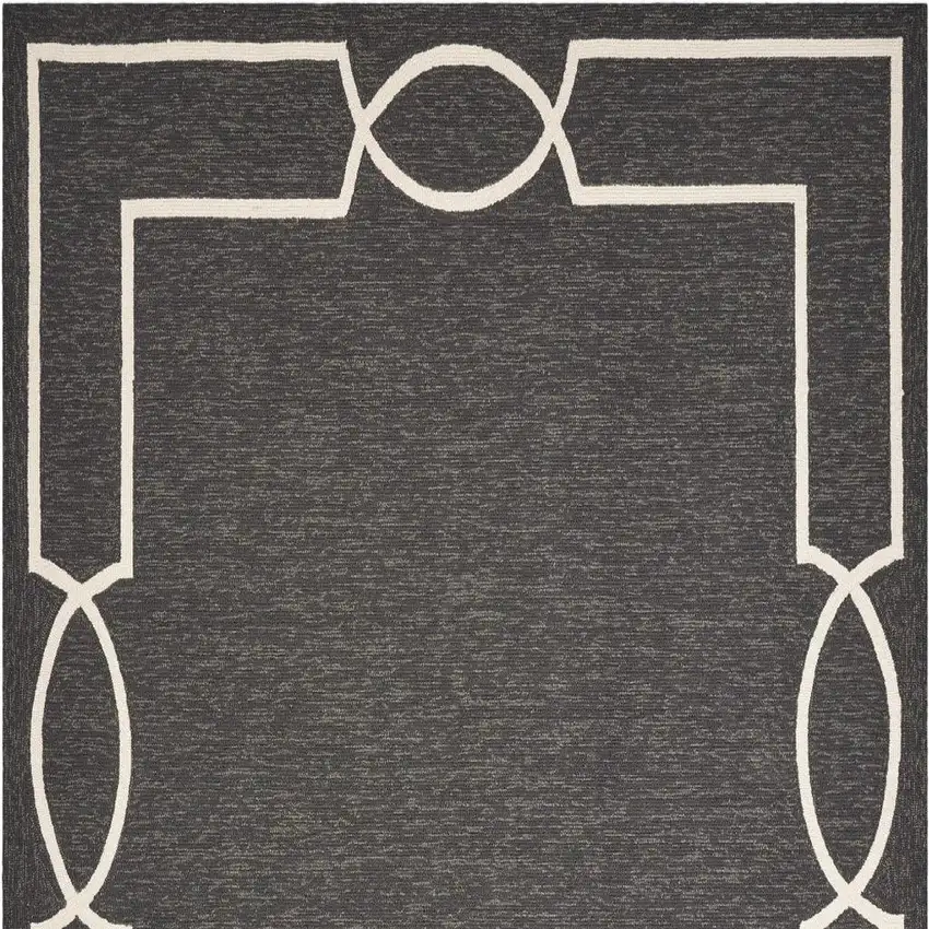 Onyx And White Geometric Handmade Indoor Outdoor Area Rug Photo 4