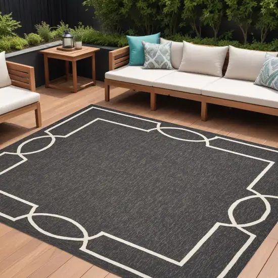 Onyx And White Geometric Handmade Indoor Outdoor Area Rug Photo 2