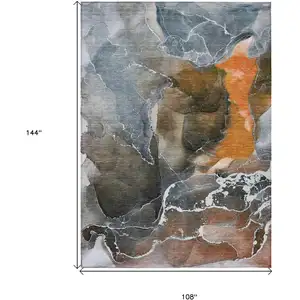 Photo of Orange Abstract Washable Non Skid Indoor Outdoor Area Rug