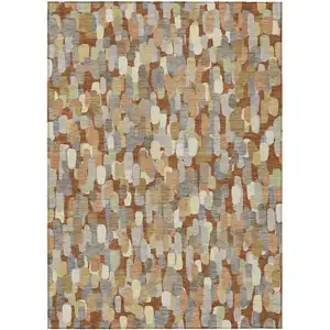 Photo of Orange And Beige Abstract Washable Indoor Outdoor Area Rug