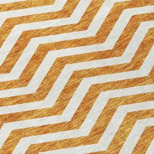Photo of Orange And Beige Chevron Washable Indoor Outdoor Area Rug