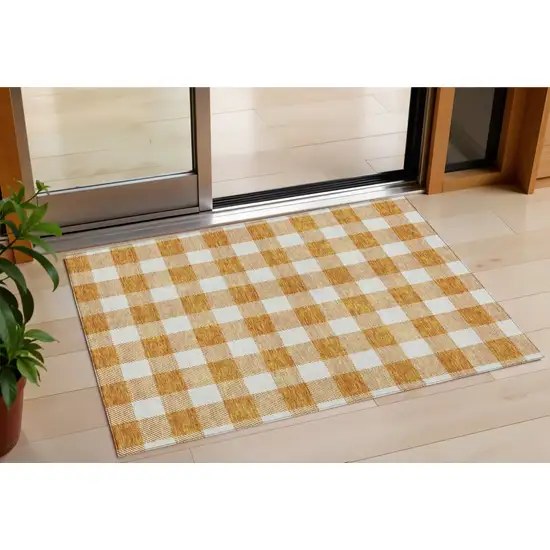 Orange And Beige Plaid Washable Indoor Outdoor Area Rug Photo 1