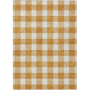 Photo of Orange And Beige Plaid Washable Indoor Outdoor Area Rug