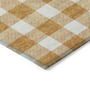 Photo of Orange And Beige Plaid Washable Indoor Outdoor Area Rug