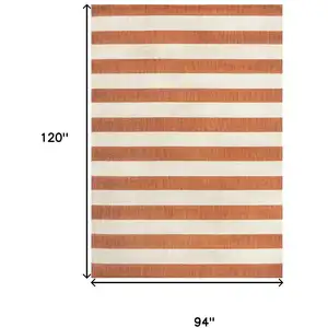 Photo of Orange And Beige Striped Indoor Outdoor Area Rug