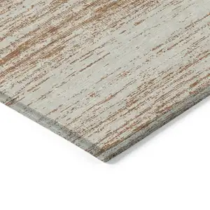 Photo of Orange And Beige Striped Washable Indoor Outdoor Area Rug