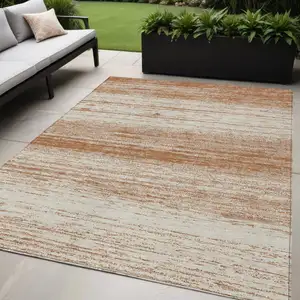 Photo of Orange And Beige Striped Washable Indoor Outdoor Area Rug
