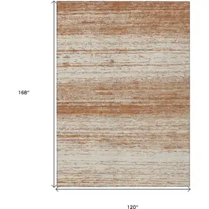 Photo of Orange And Beige Striped Washable Indoor Outdoor Area Rug
