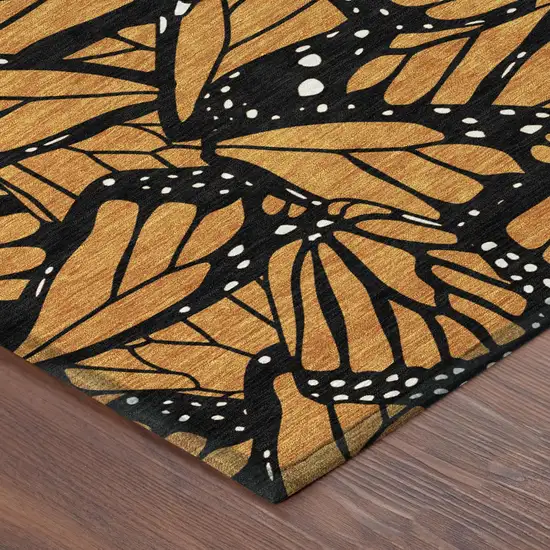 Orange And Black Animal Print Washable Indoor Outdoor Area Rug Photo 3
