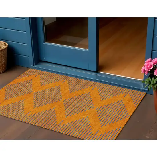 Orange And Blue Geometric Washable Indoor Outdoor Area Rug Photo 1