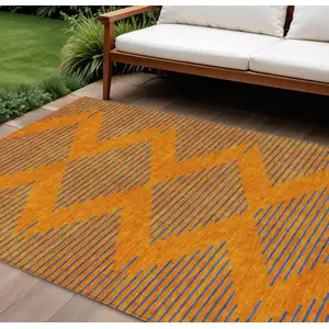 Photo of Orange And Blue Geometric Washable Indoor Outdoor Area Rug