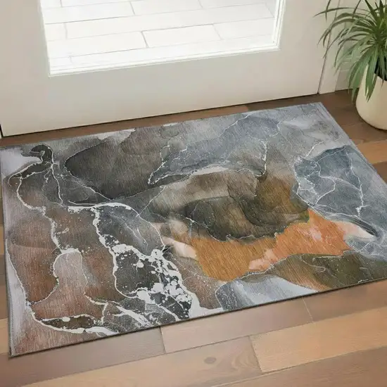 Orange And Charcoal Abstract Washable Area Rug With UV Protection Photo 1