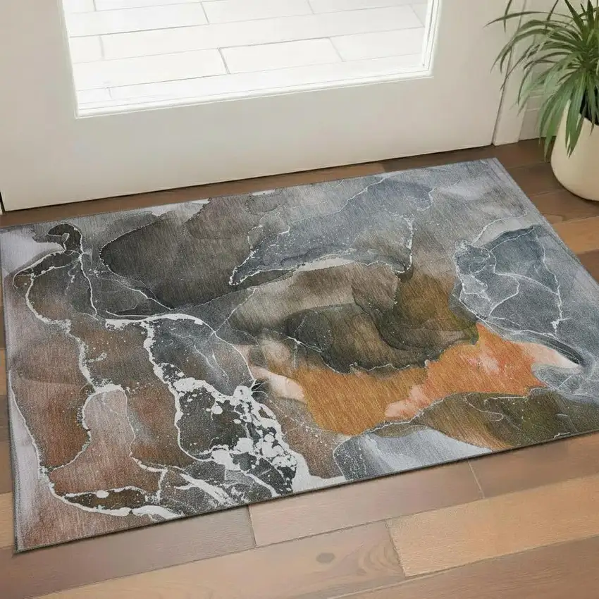 Orange And Charcoal Abstract Washable Area Rug With UV Protection Photo 1