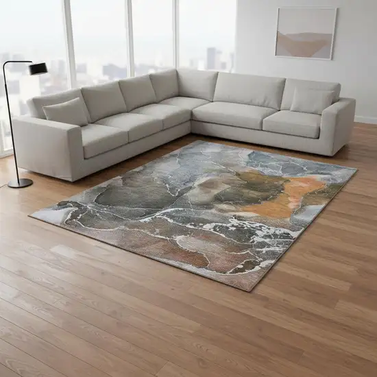 Orange And Charcoal Abstract Washable Area Rug With UV Protection Photo 1