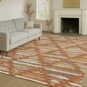 Photo of Orange And Charcoal Southwestern Washable Indoor Outdoor Area Rug