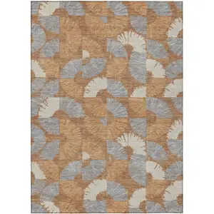 Photo of Orange And Copper Geometric Washable Indoor Outdoor Area Rug