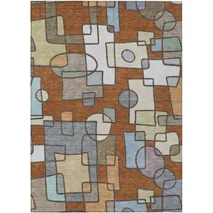 Photo of Orange And Copper Geometric Washable Indoor Outdoor Area Rug
