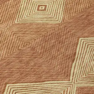 Photo of Orange And Copper Geometric Washable Indoor Outdoor Area Rug