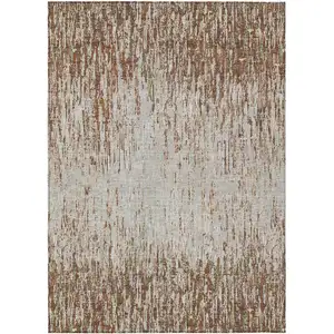 Photo of Orange And Copper Striped Washable Indoor Outdoor Area Rug