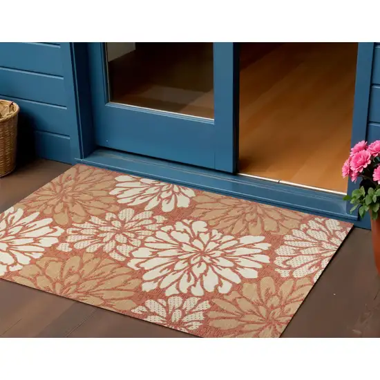 Orange And Cream Floral Indoor Outdoor Area Rug Photo 1