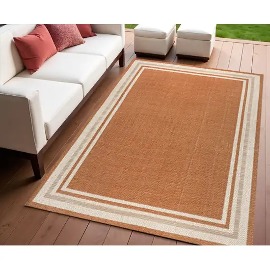 Orange And Cream Indoor Outdoor Area Rug Photo 1
