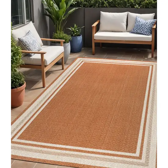 Orange And Cream Indoor Outdoor Area Rug Photo 1
