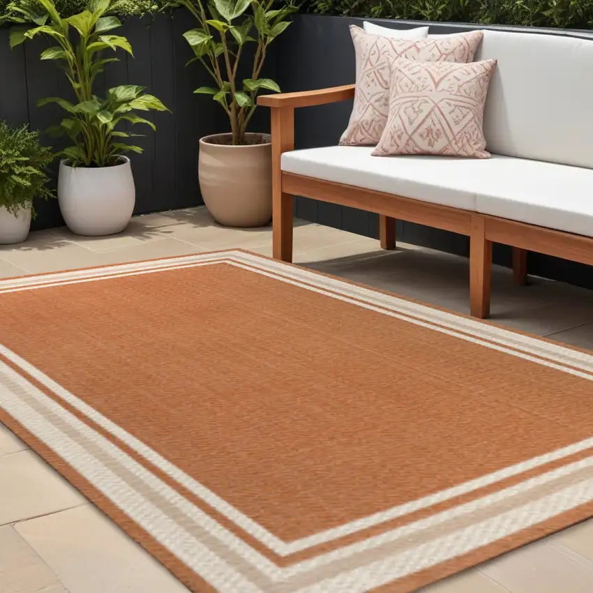 Orange And Cream Indoor Outdoor Area Rug Photo 1