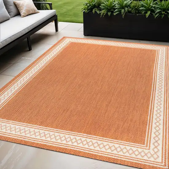 Orange And Cream Indoor Outdoor Area Rug Photo 1