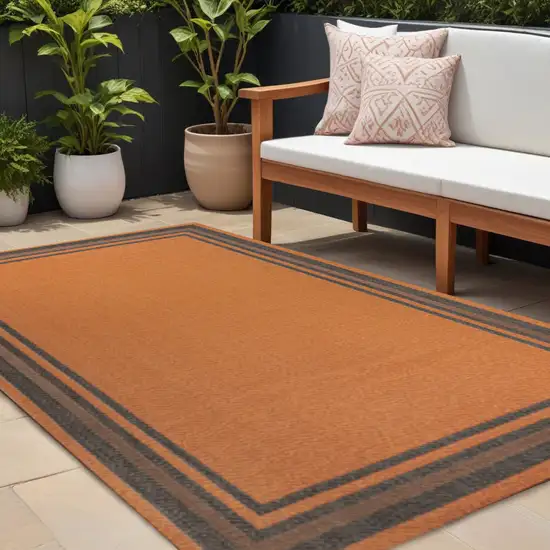 Orange And Dark Gray Striped Indoor Outdoor Area Rug Photo 1