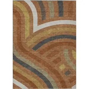 Photo of Orange And Gold Abstract Washable Indoor Outdoor Area Rug