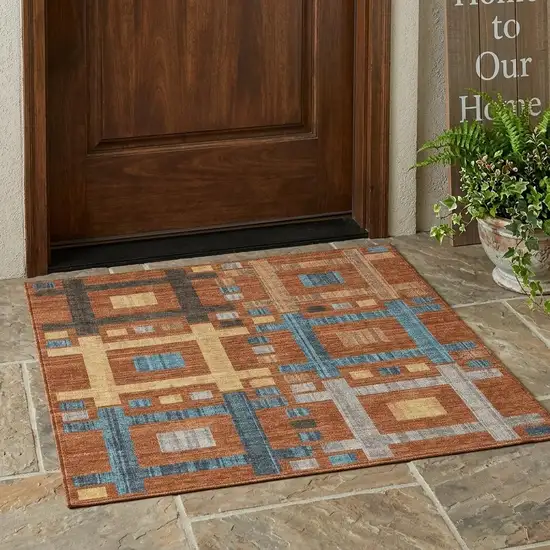 Orange And Gold Geometric Washable Indoor Outdoor Area Rug Photo 1
