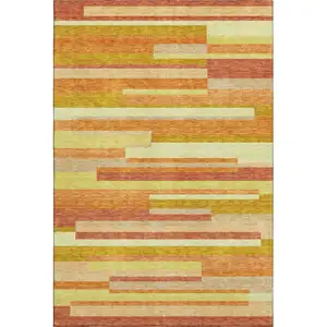 Photo of Orange And Gold Striped Washable Area Rug With UV Protection