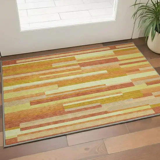 Orange And Gold Striped Washable Area Rug With UV Protection Photo 2