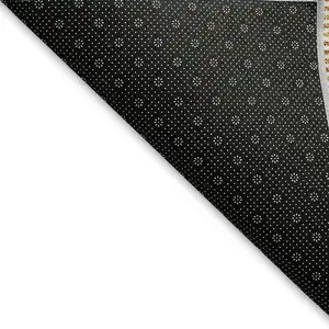 Photo of Orange And Ivory Abstract Geometric Washable Area Rug With UV Protection