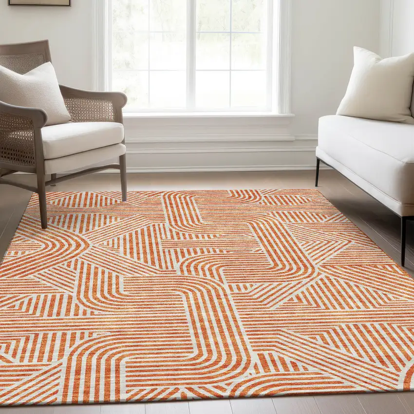 Orange And Ivory Abstract Geometric Washable Area Rug With UV Protection Photo 6