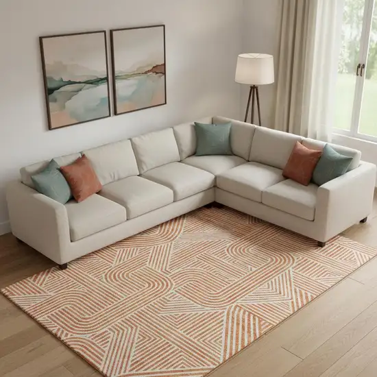 Orange And Ivory Abstract Geometric Washable Area Rug With UV Protection Photo 1