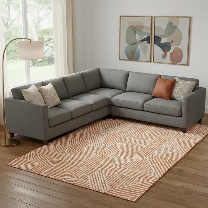 Orange And Ivory Abstract Geometric Washable Area Rug With UV Protection Photo 1