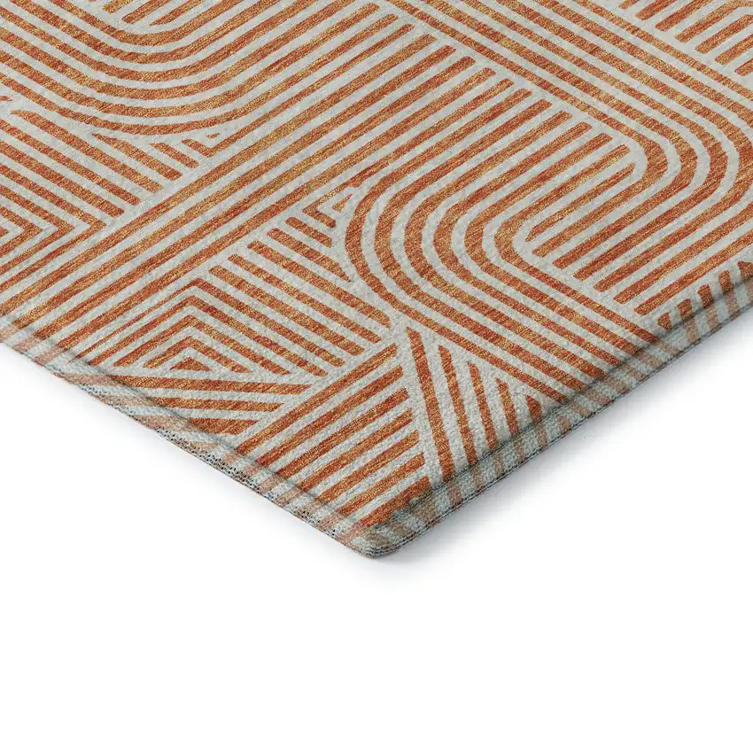 Orange And Ivory Abstract Geometric Washable Area Rug With UV Protection Photo 7