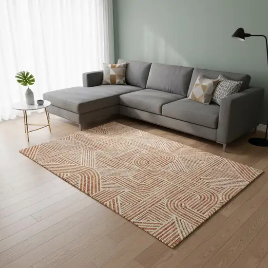 Orange And Ivory Abstract Geometric Washable Area Rug With UV Protection Photo 2