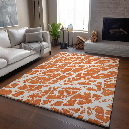 Orange And Ivory Abstract Washable Area Rug With UV Protection Photo 6