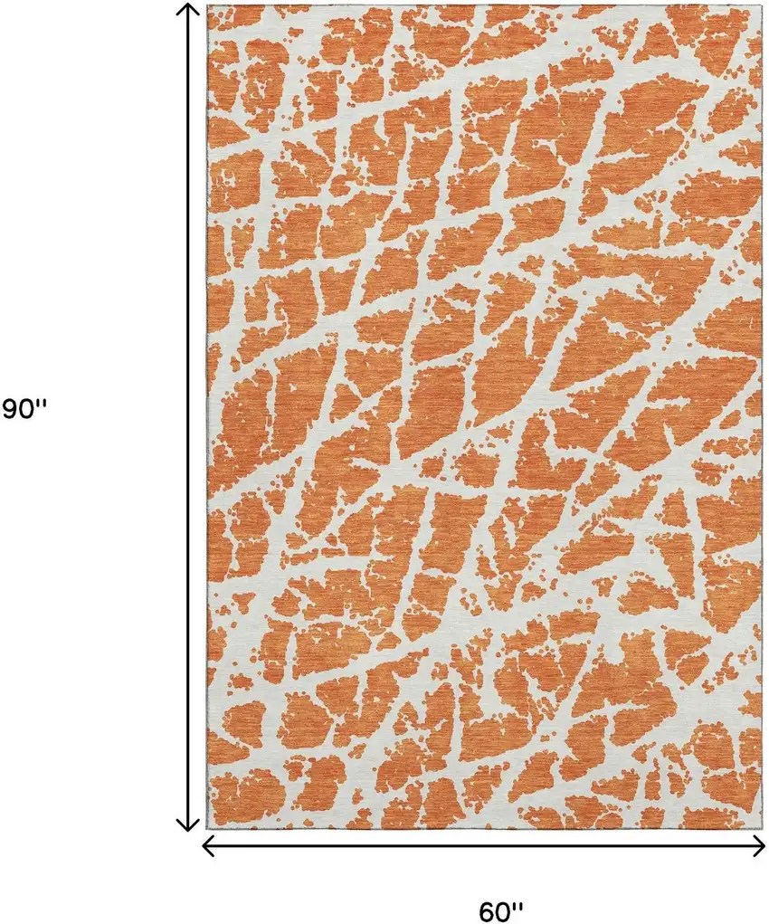 Orange And Ivory Abstract Washable Area Rug With UV Protection Photo 3